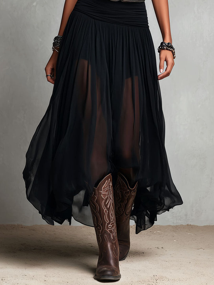 Abito lungo elasticizzato nero stile boho-western con gonna trasparente