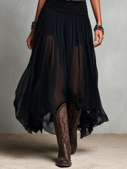 Abito lungo elasticizzato nero stile boho-western con gonna trasparente