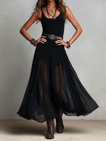 Abito lungo elasticizzato nero stile boho-western con gonna trasparente