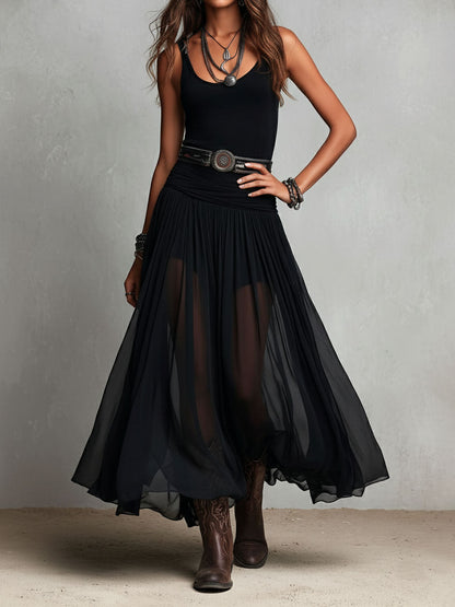 Abito lungo elasticizzato nero stile boho-western con gonna trasparente