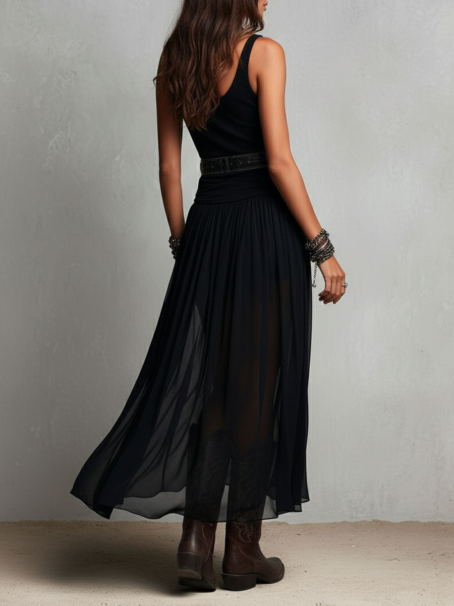Abito lungo elasticizzato nero stile boho-western con gonna trasparente