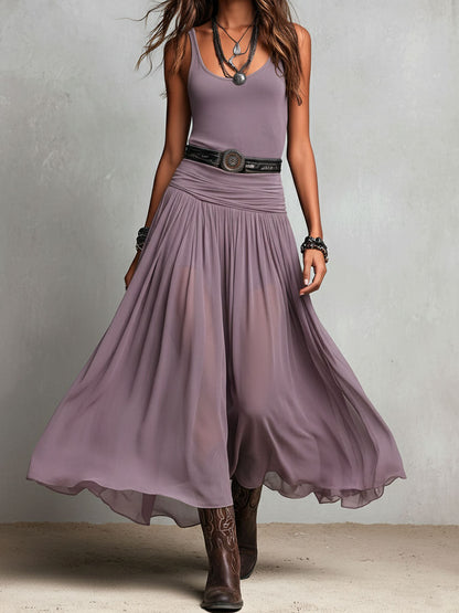Abito lungo elasticizzato nero stile boho-western con gonna trasparente